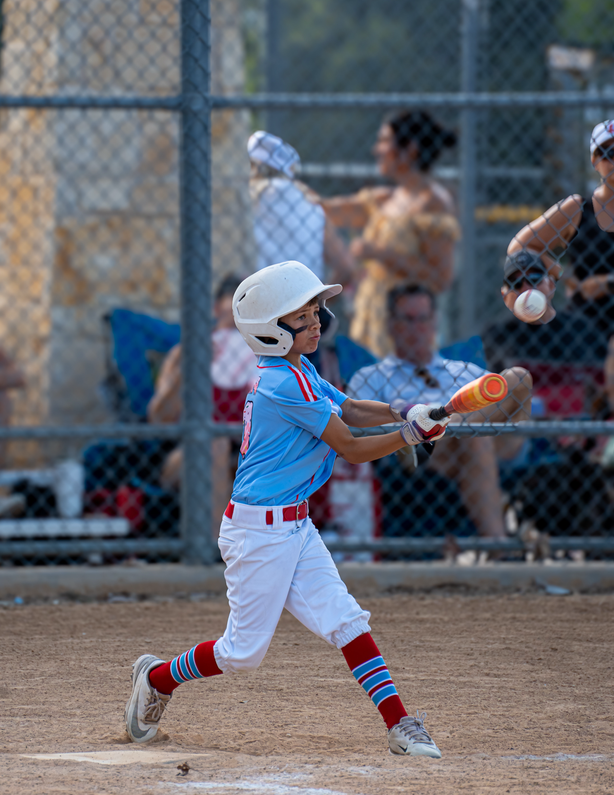 Mudbugs youth baseball player at bat